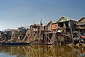 Tonle Sap - Kampong Phluk floating village - stilted houses 